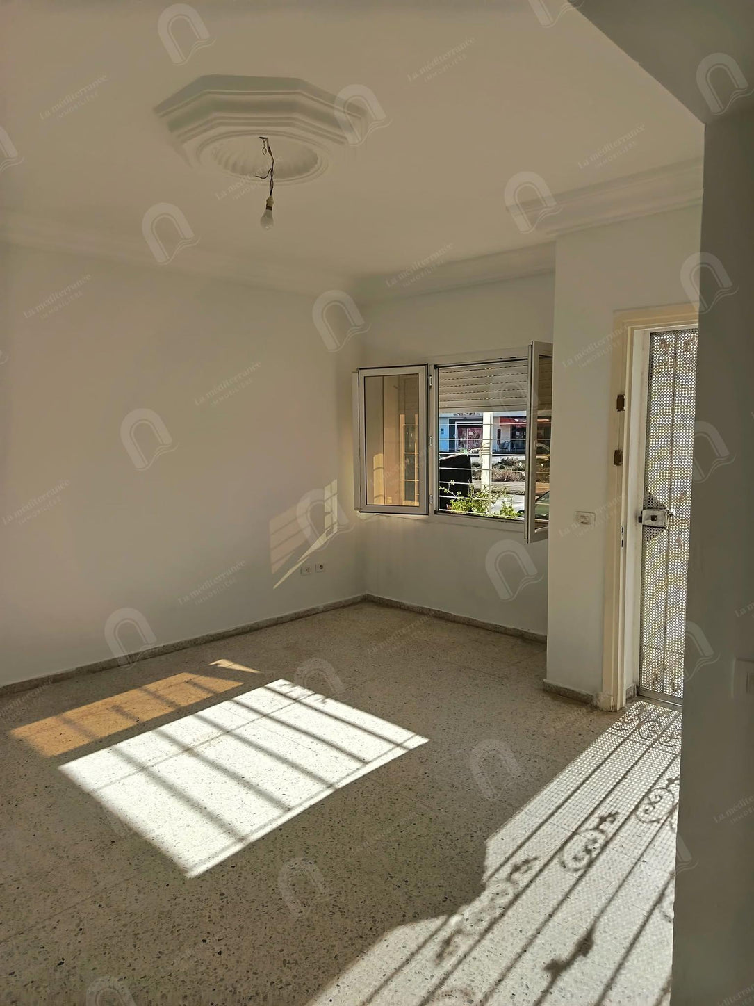 à vendre un appartement au RDC