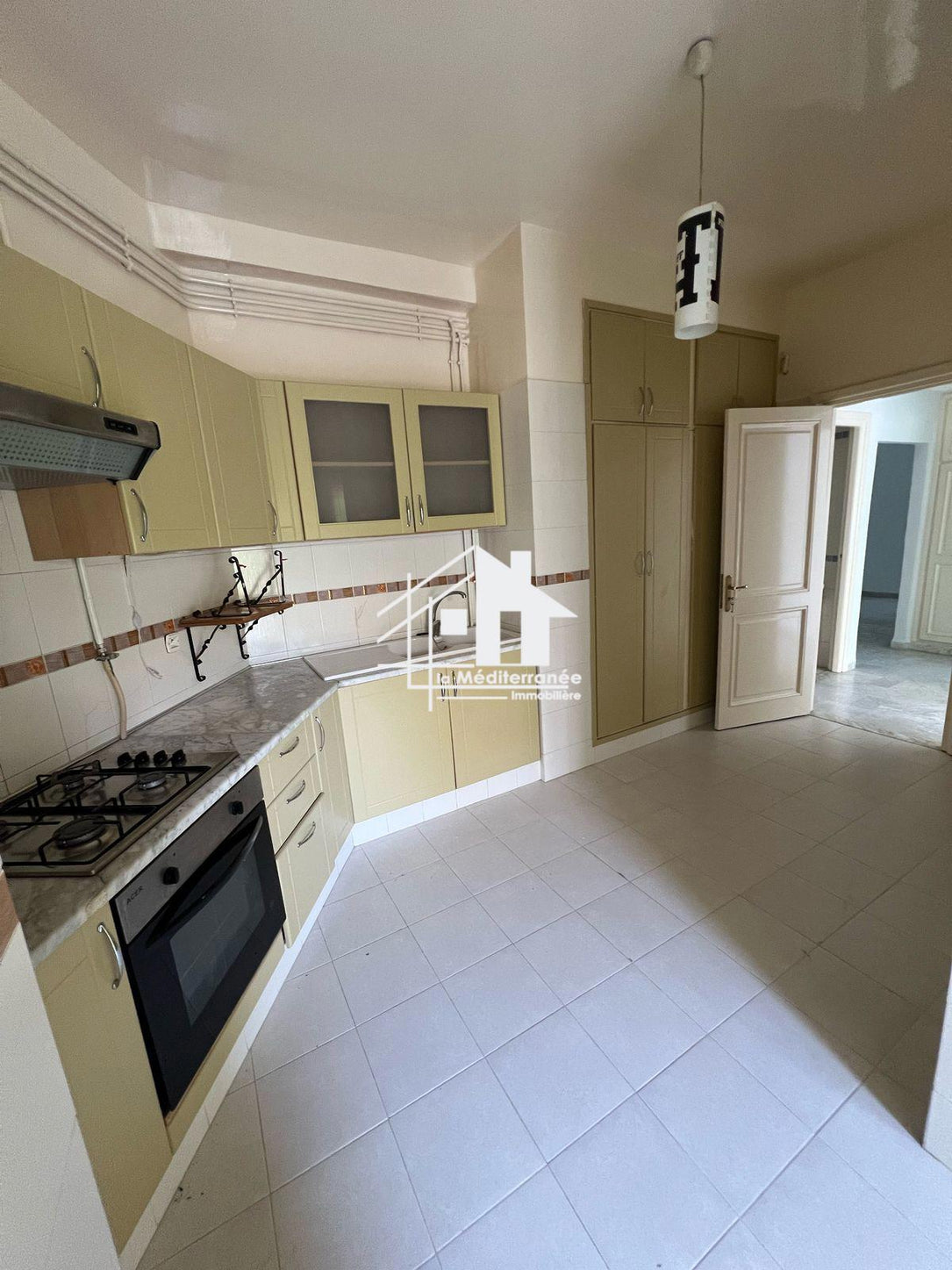 À vendre Appartement S+2 avec jardin à El Menzah 7bis
