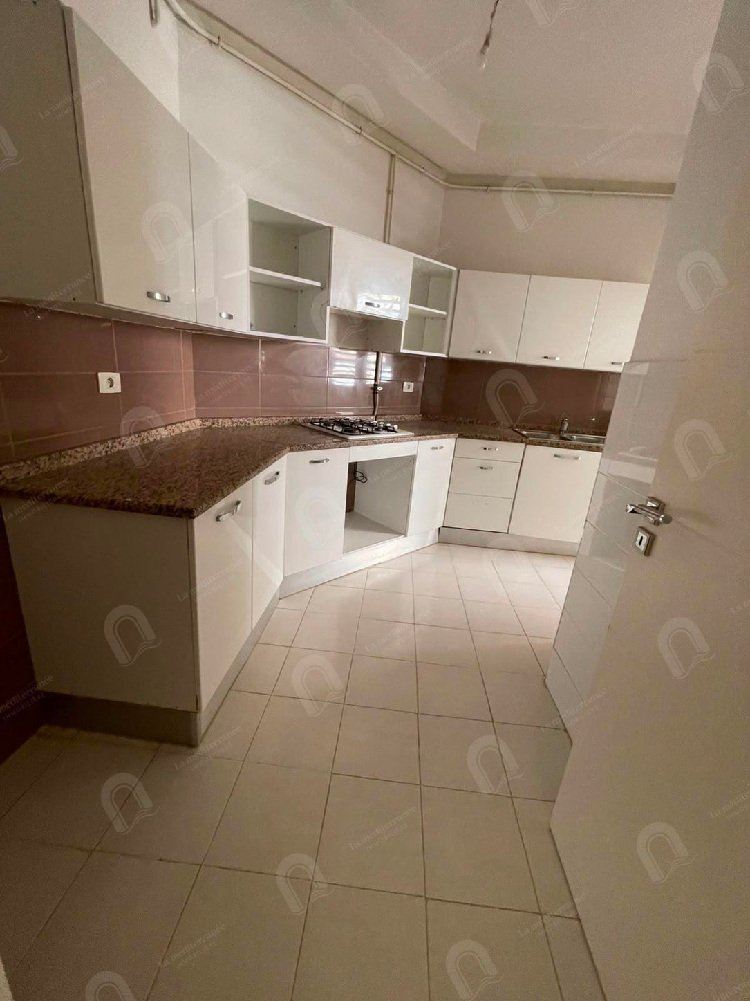 a vendre  un appartement s+2  jardin el menzeh 2