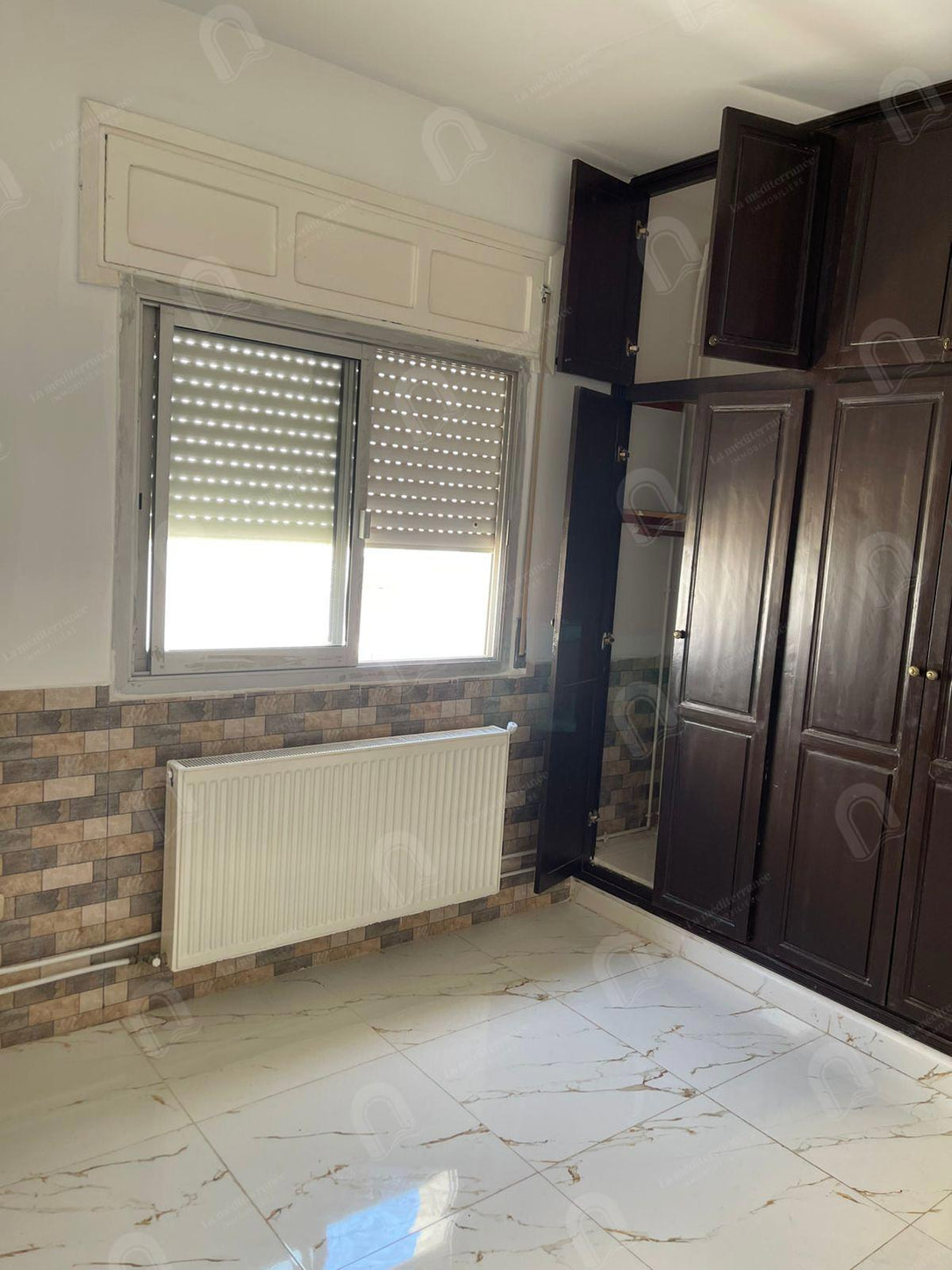 A louer un appartement s+1 à cité Ennaser
