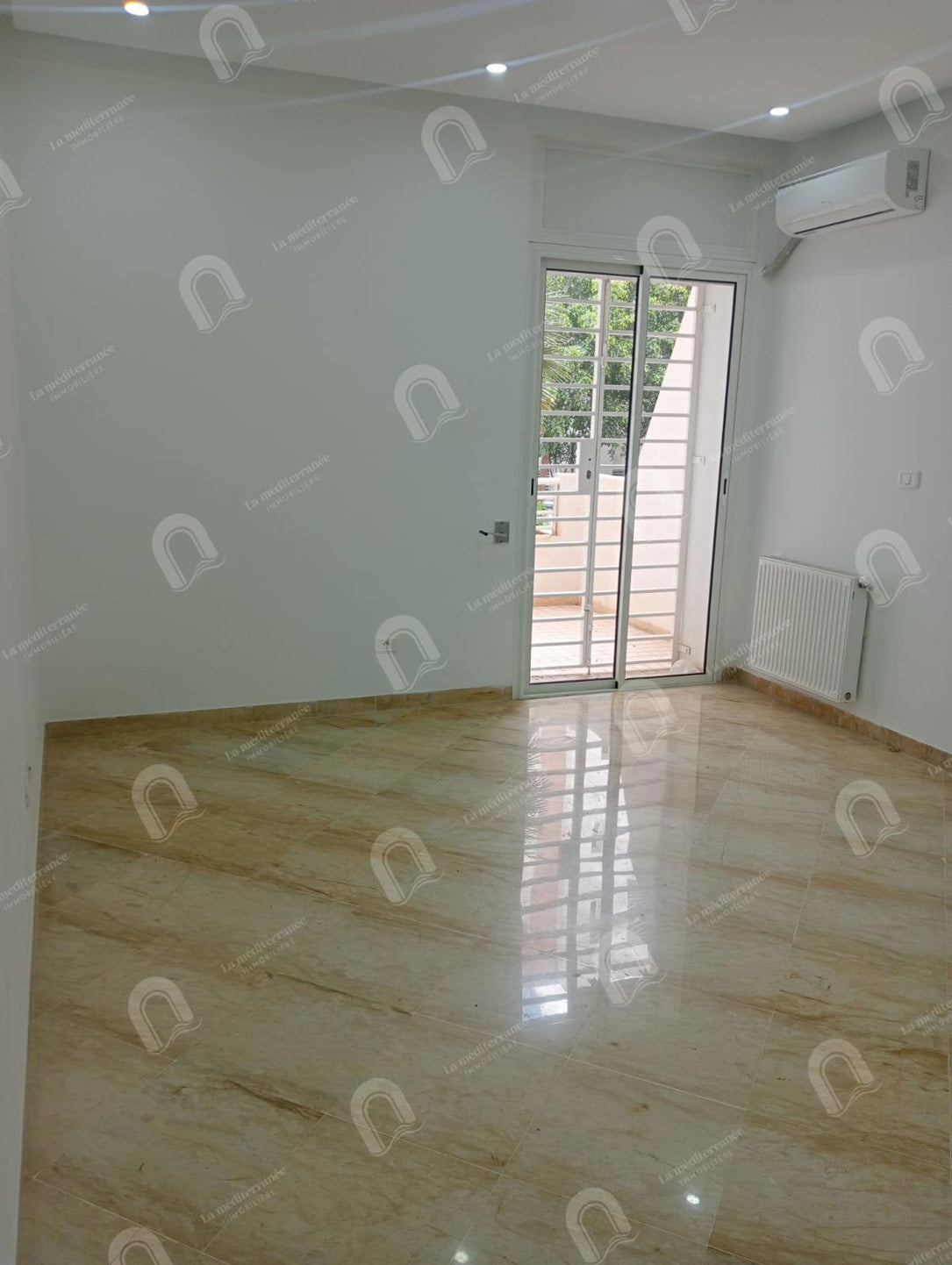 à vendre un appartement s+2 aux jardins d'el menzah 2