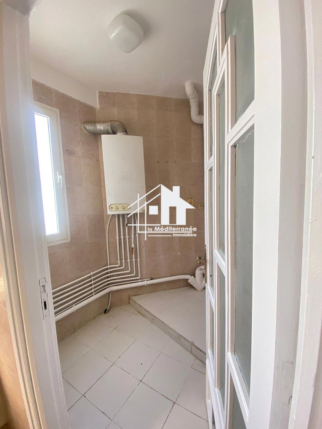 À louer appartement s+3 a cité ennaser 2
