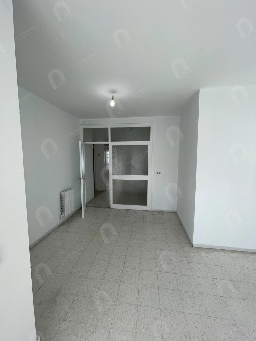 A vendre un appartement S+3 à cité ennasr