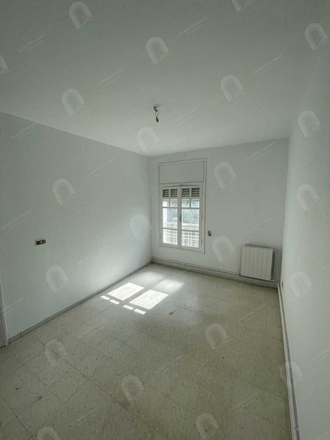 A vendre un appartement S+3 à cité ennasr