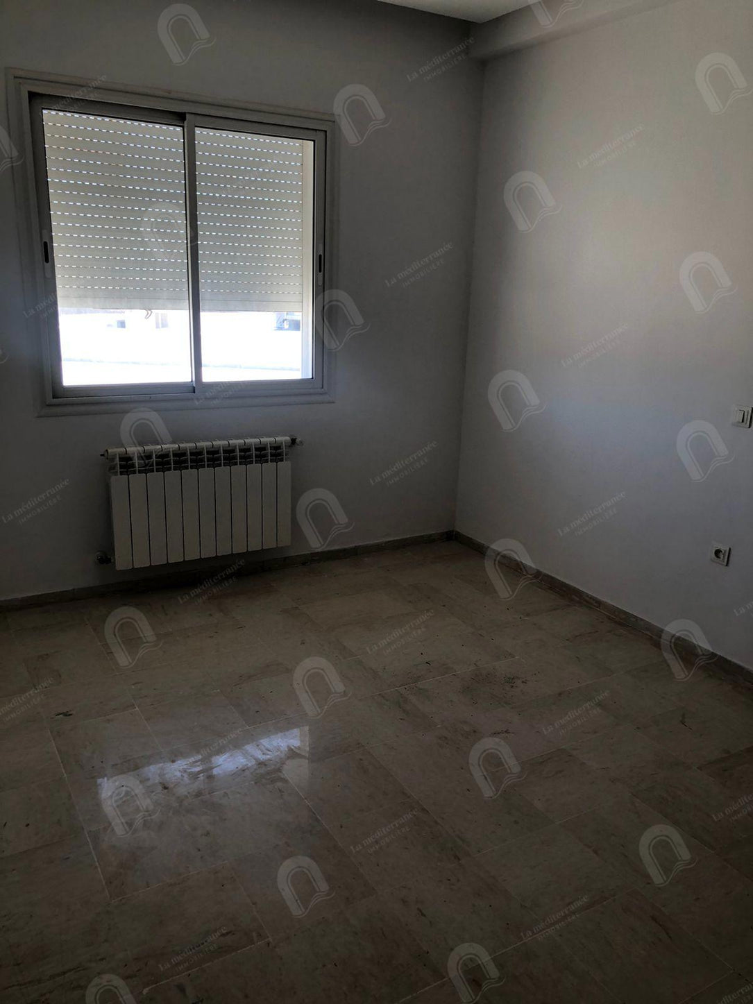 a louer un apratement s+3 a cité Enasser