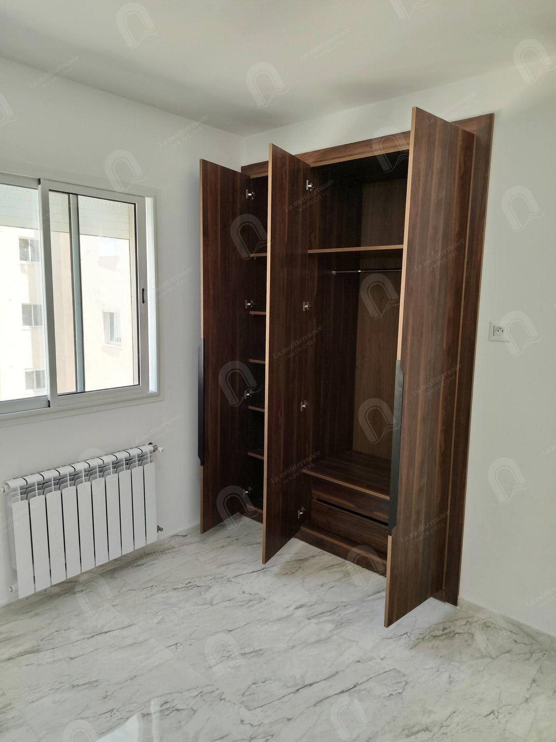 A louer appartement S+2 hst jamais habité à cité Ettahrir