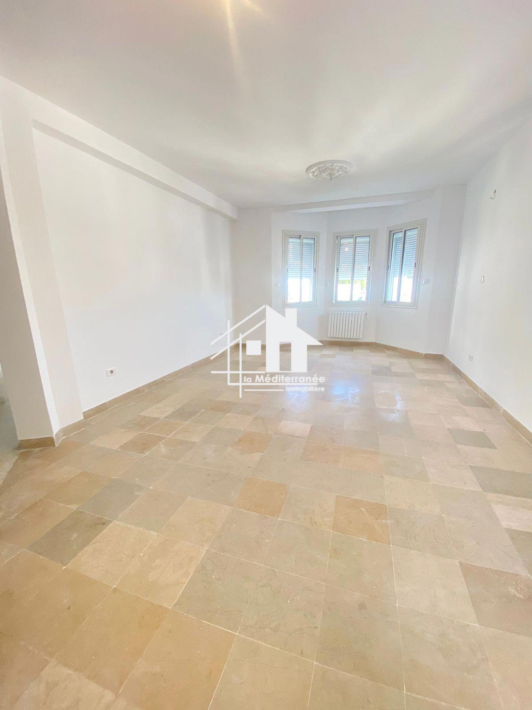 À louer appartement s+3 a cité ennaser 2