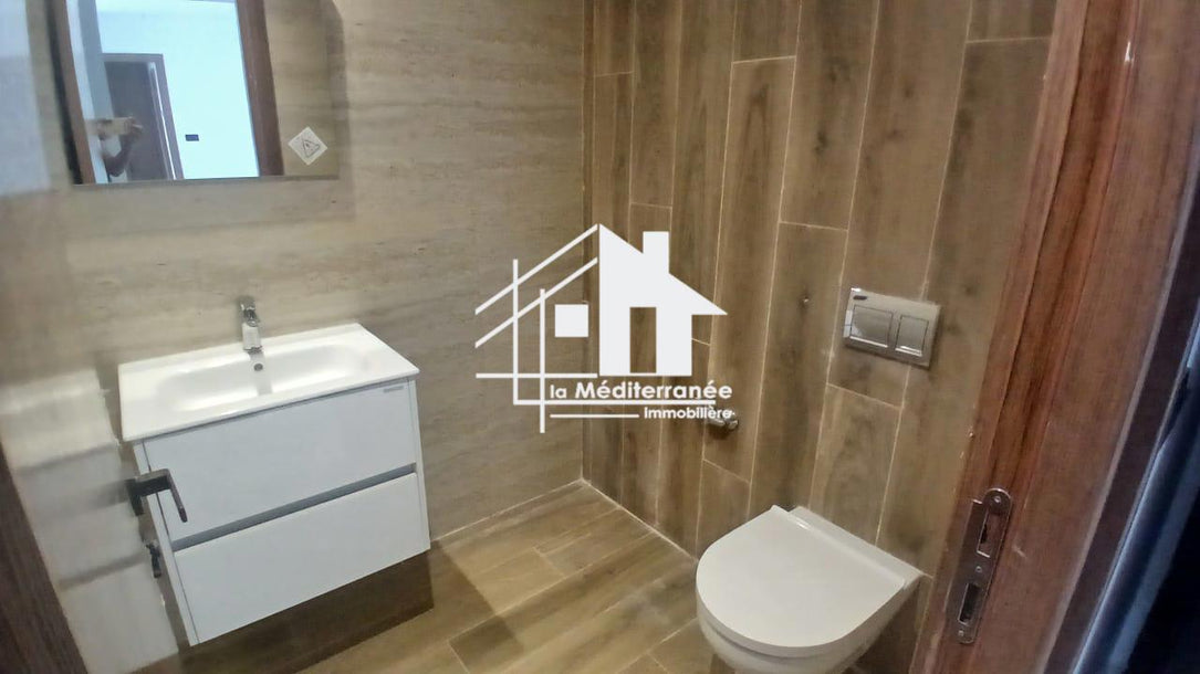 A vendre un appartement S+3 RDC a jardin de carthage