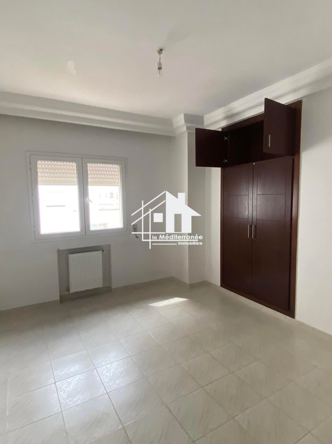 A vendre un appartement S+4 à Ezzahra