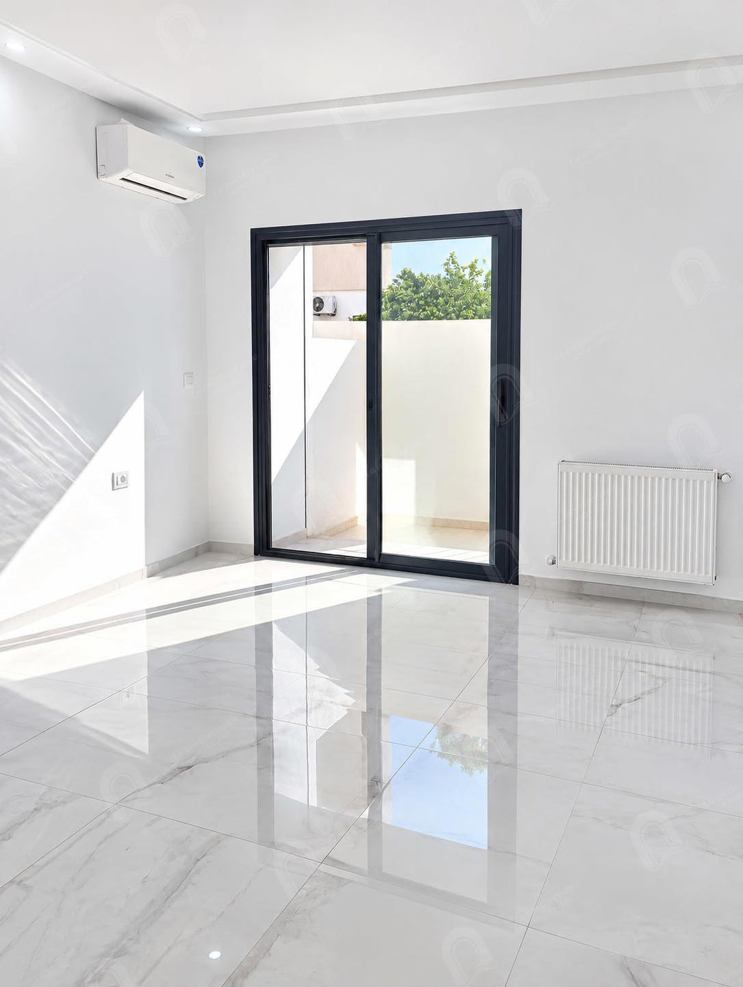 A vendre un appartement S+2 hst situé au Rdc à manouba