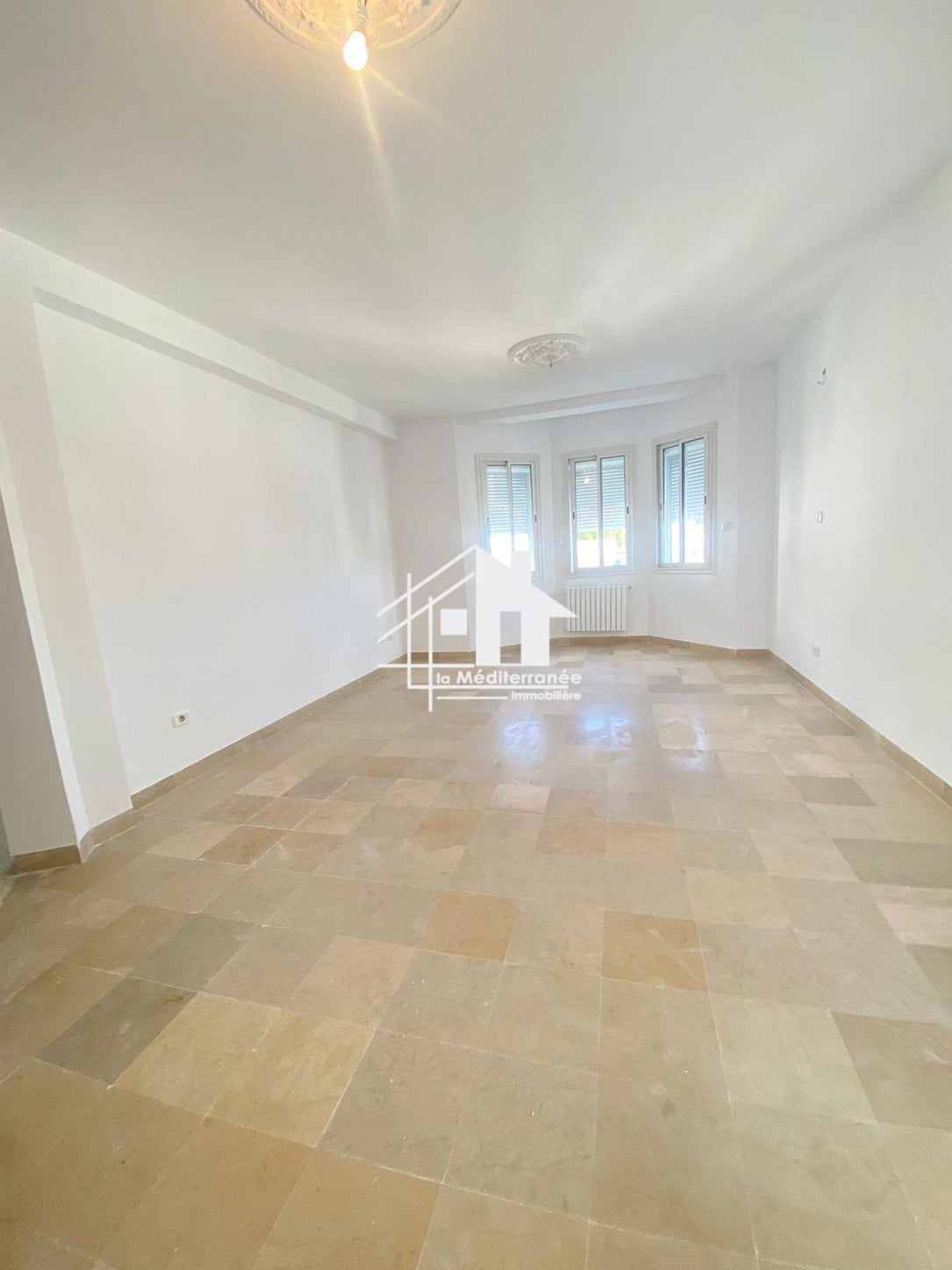 À louer appartement s+3 a cité ennaser 2
