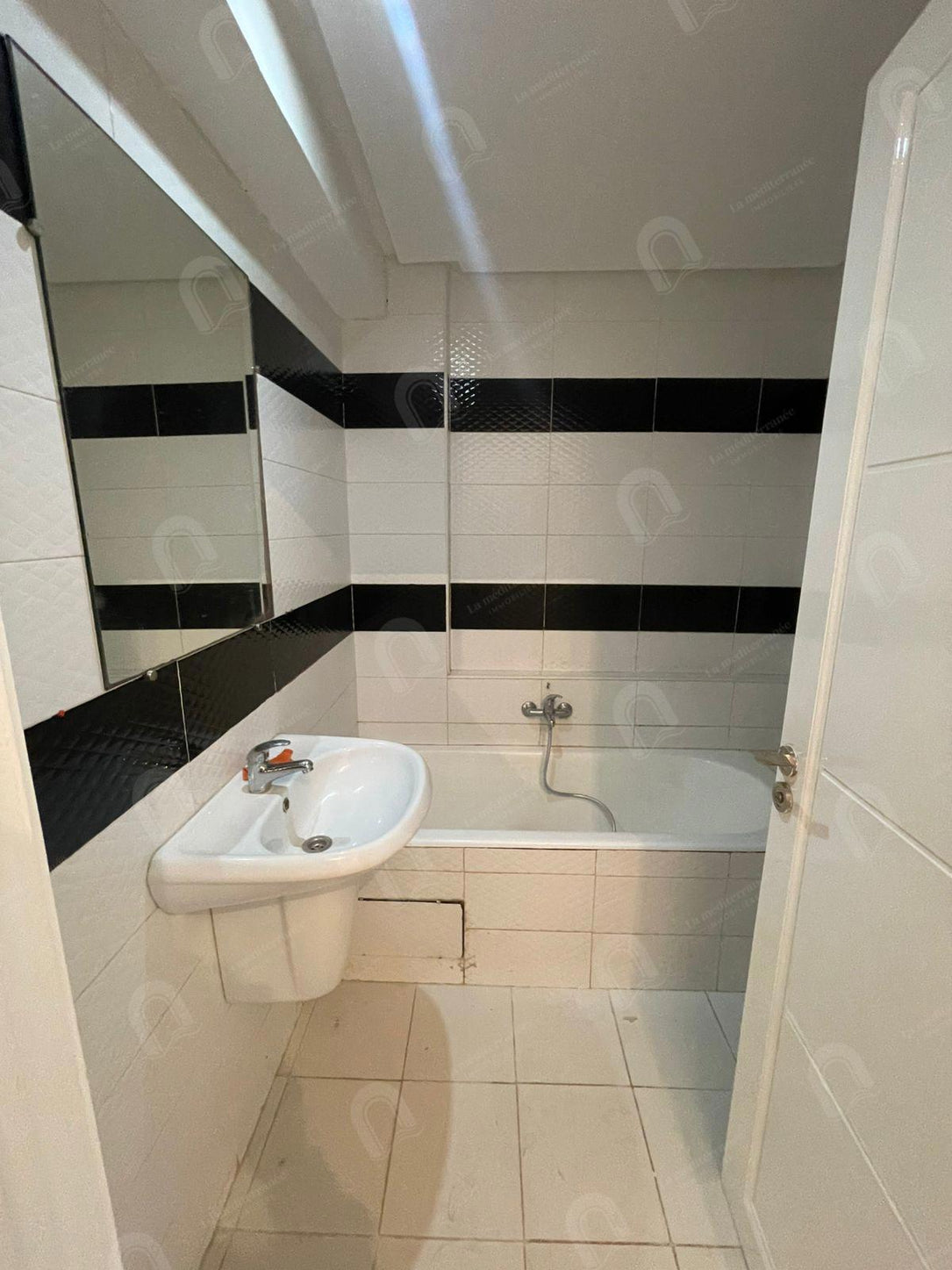 à louer un appartement s+2 aux jardins d'el menzah 2