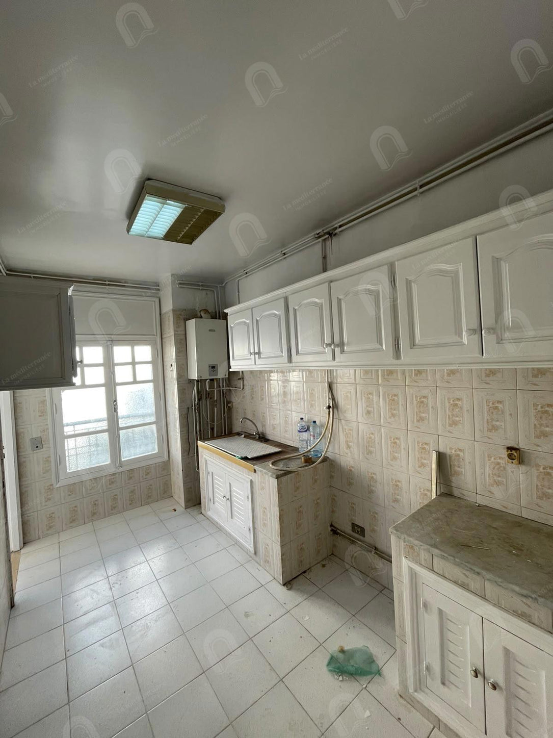 A vendre un appartement S+3 à cité ennasr
