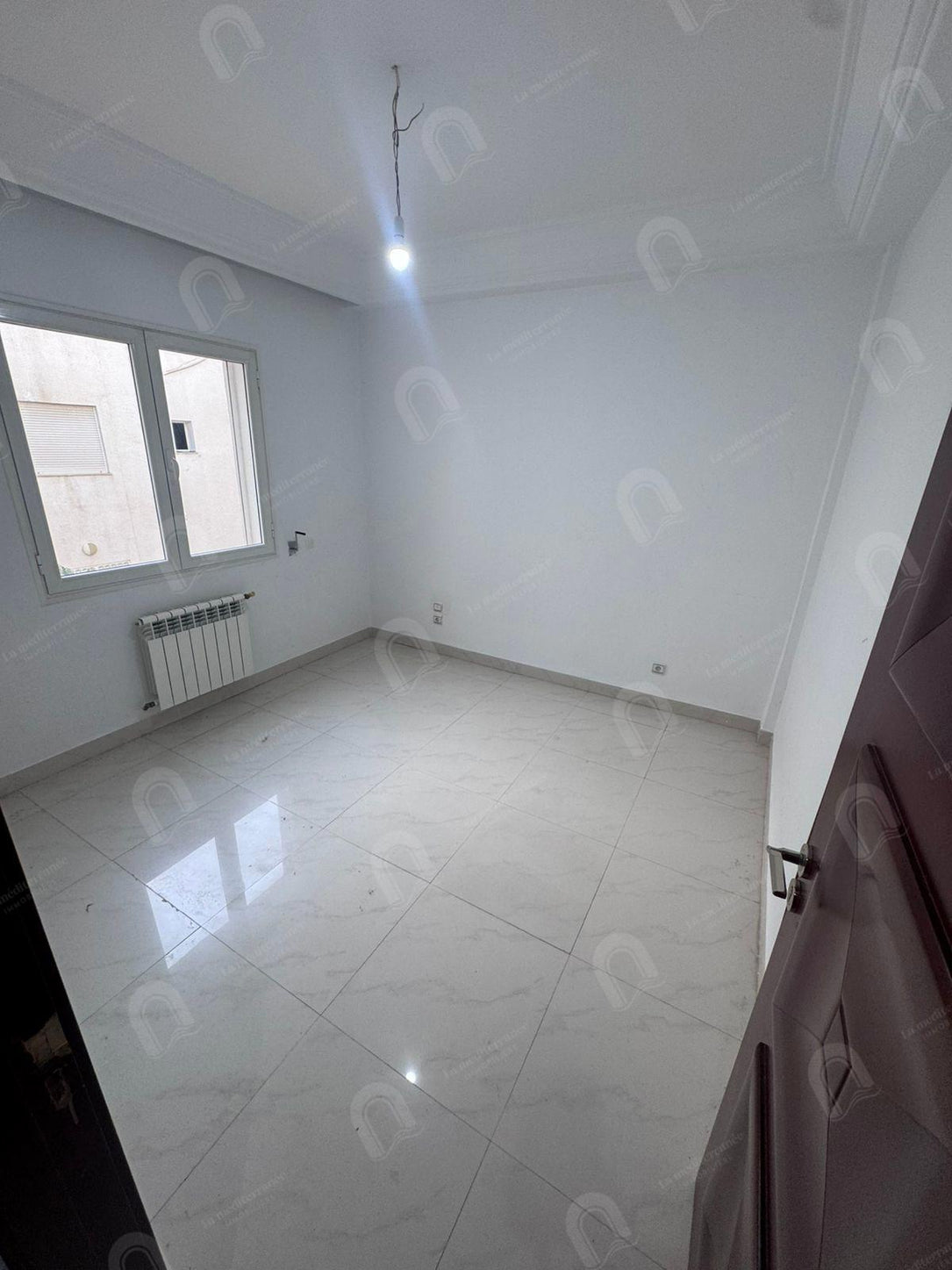 A louer Appartement S+3 hst au bardo