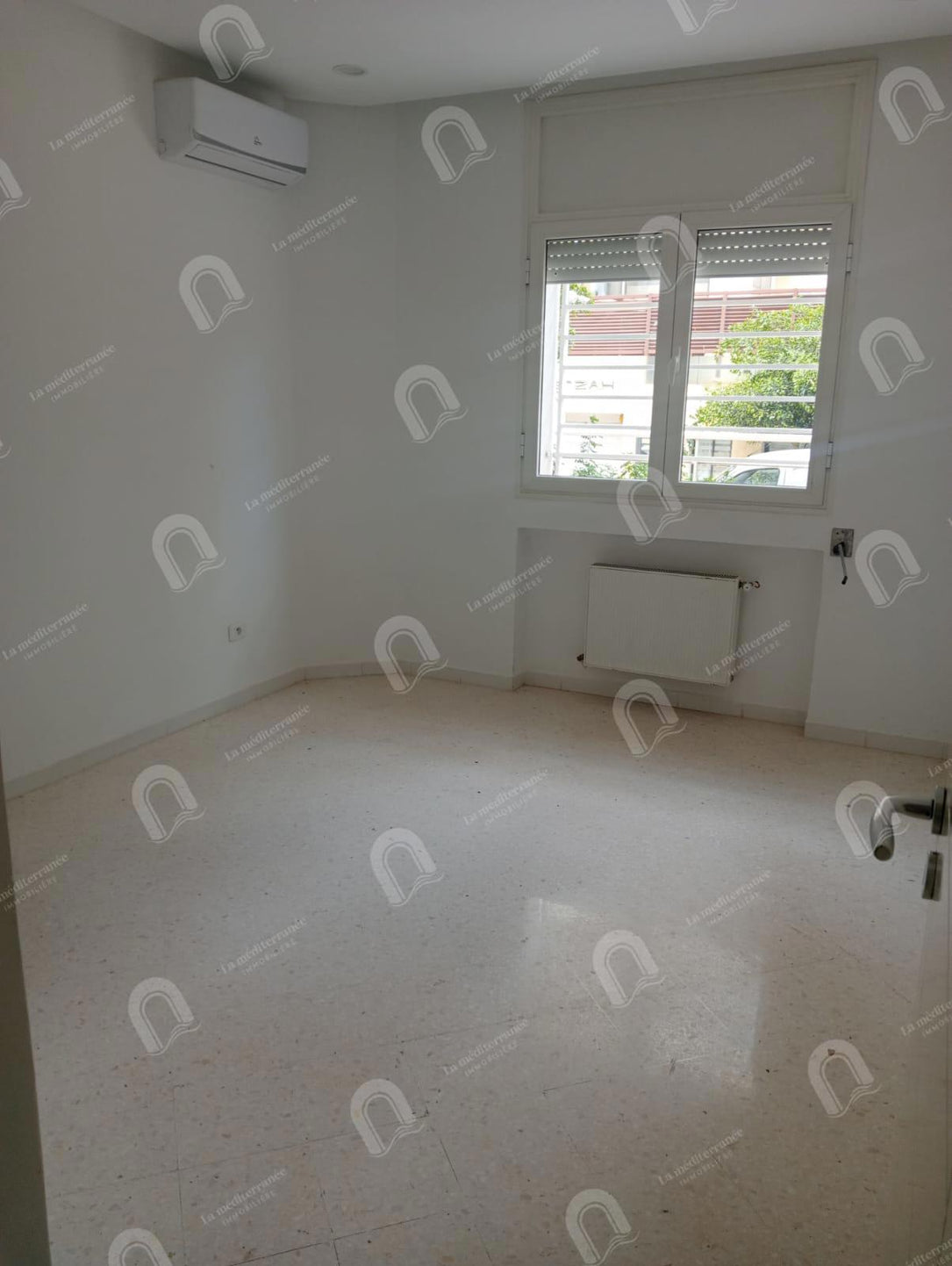 à vendre un appartement s+2 aux jardins d'el menzah 2