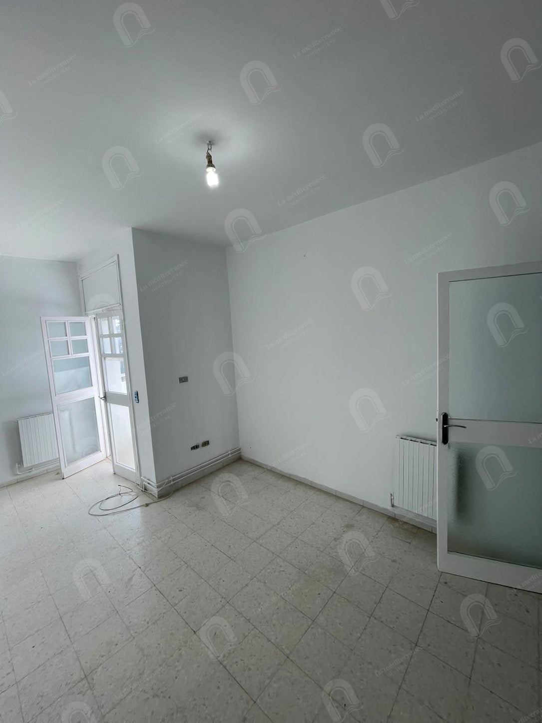 A vendre un appartement S+3 à cité ennasr