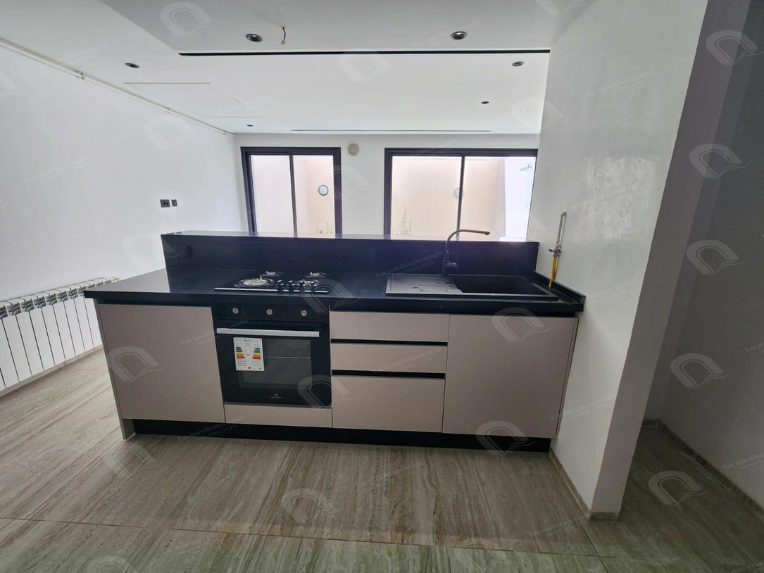 A vendre un duplex neuf de type s2 avec jardin