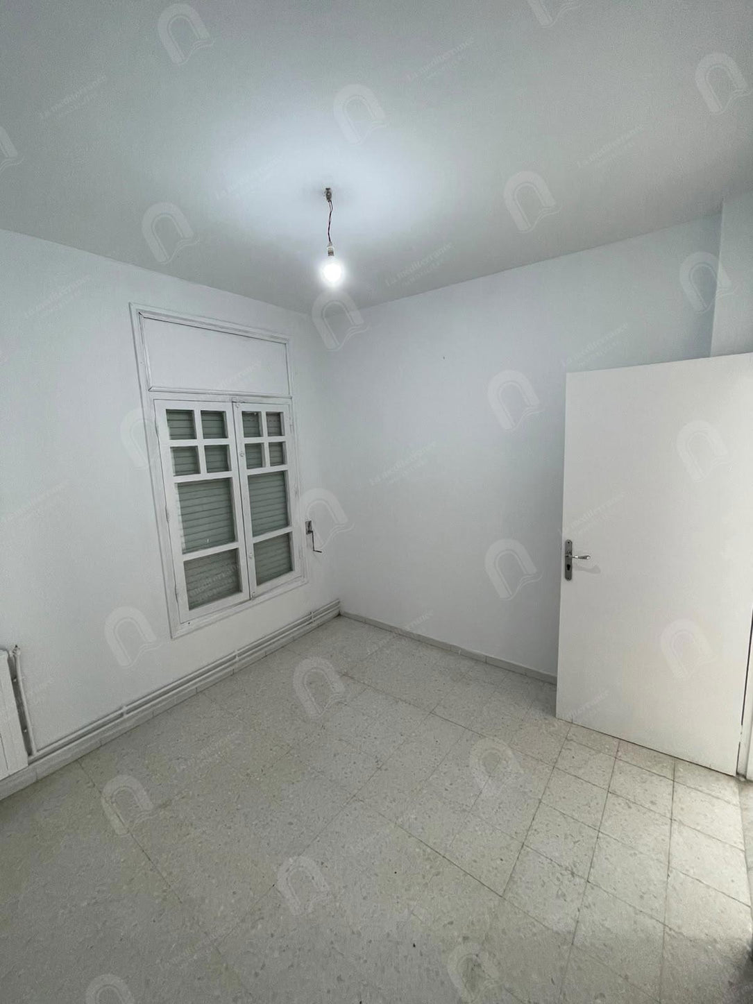 A vendre un appartement S+3 à cité ennasr