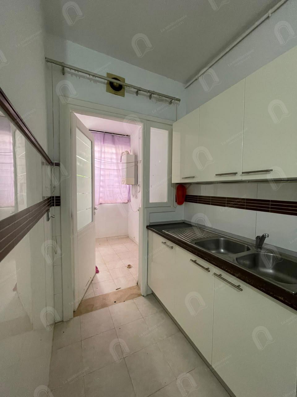 A vendre un appartement s+2 à jardin d'el menzah 22