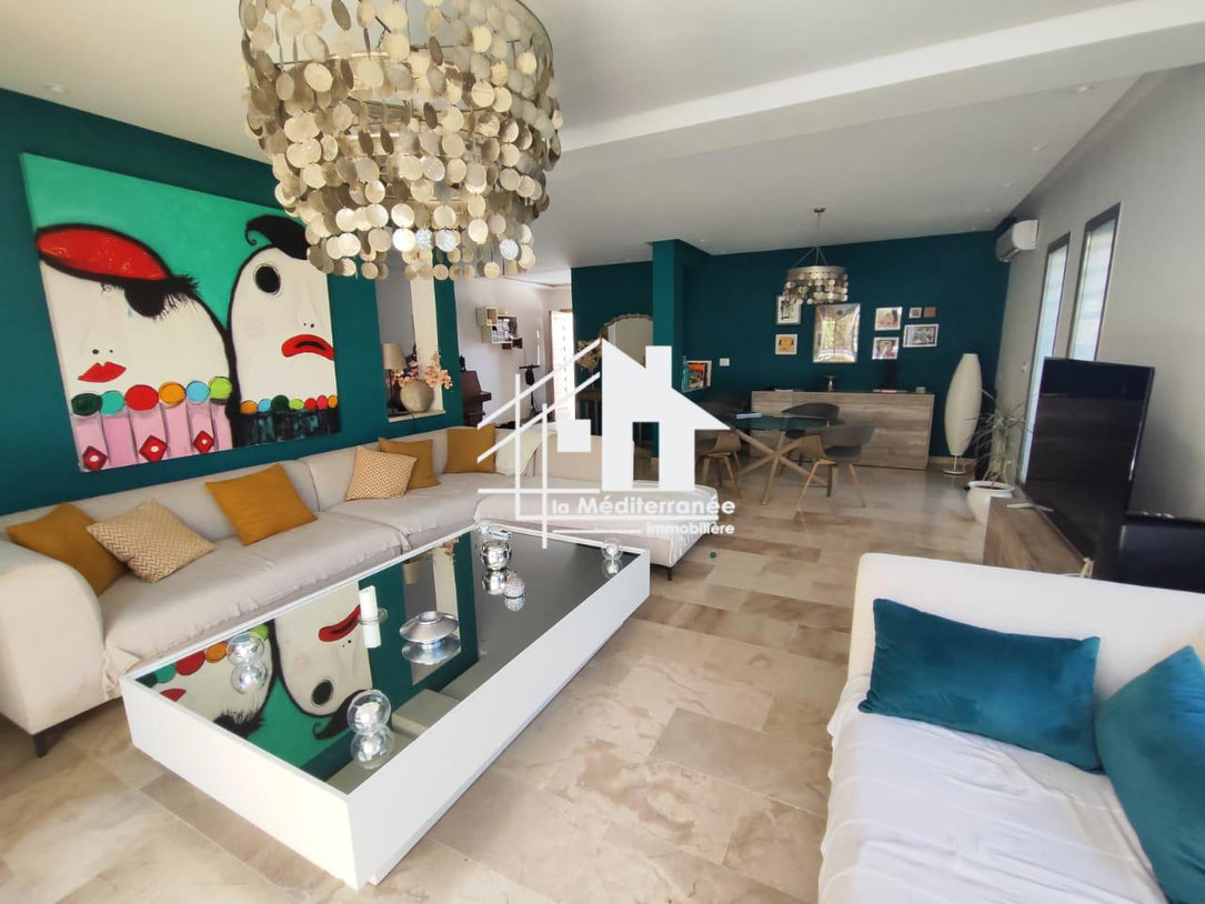 A vendre une superbe villa jumelée avec piscine et jardin