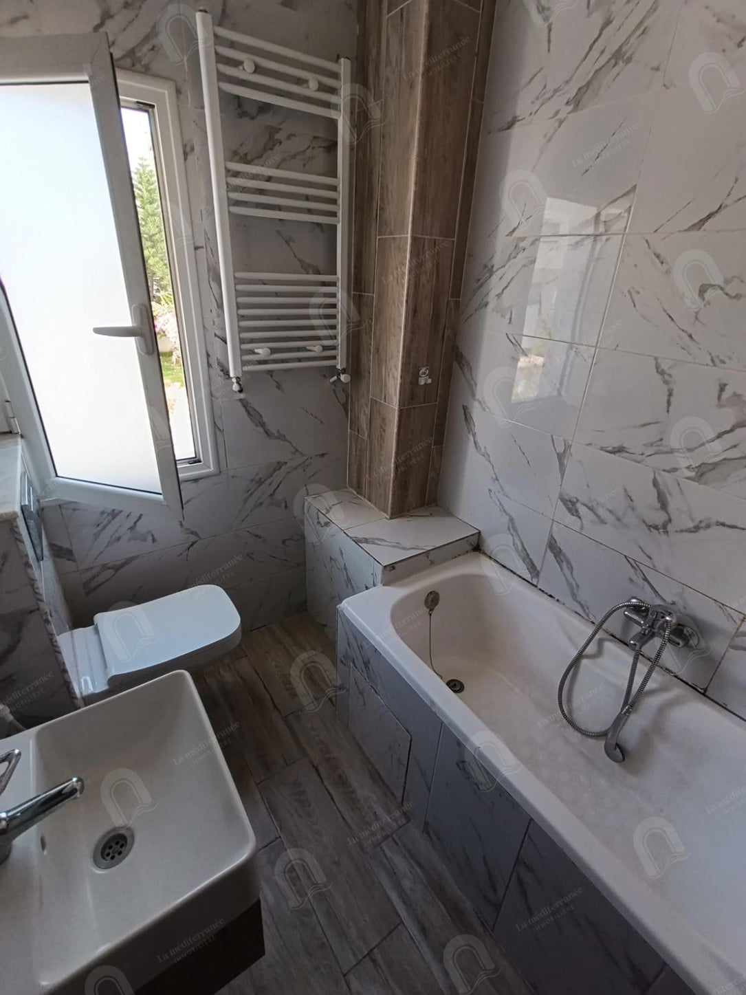 A louer un appartement s+2 à jardin d'el menzah 2