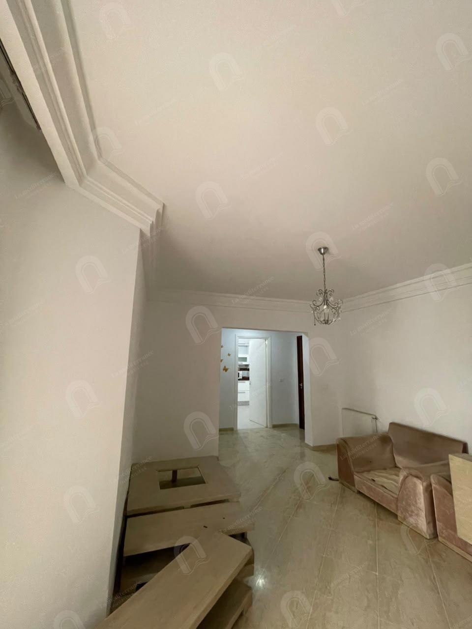 A vendre un appartement s+2 à jardin d'el menzah 22