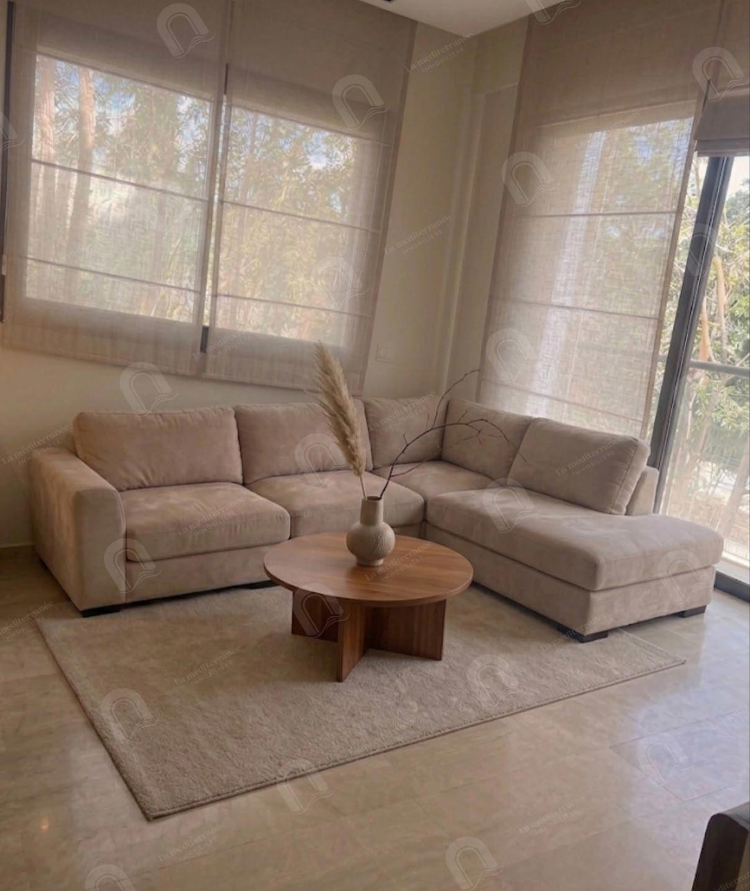A vendre une villa jumelée avec piscine et jardin