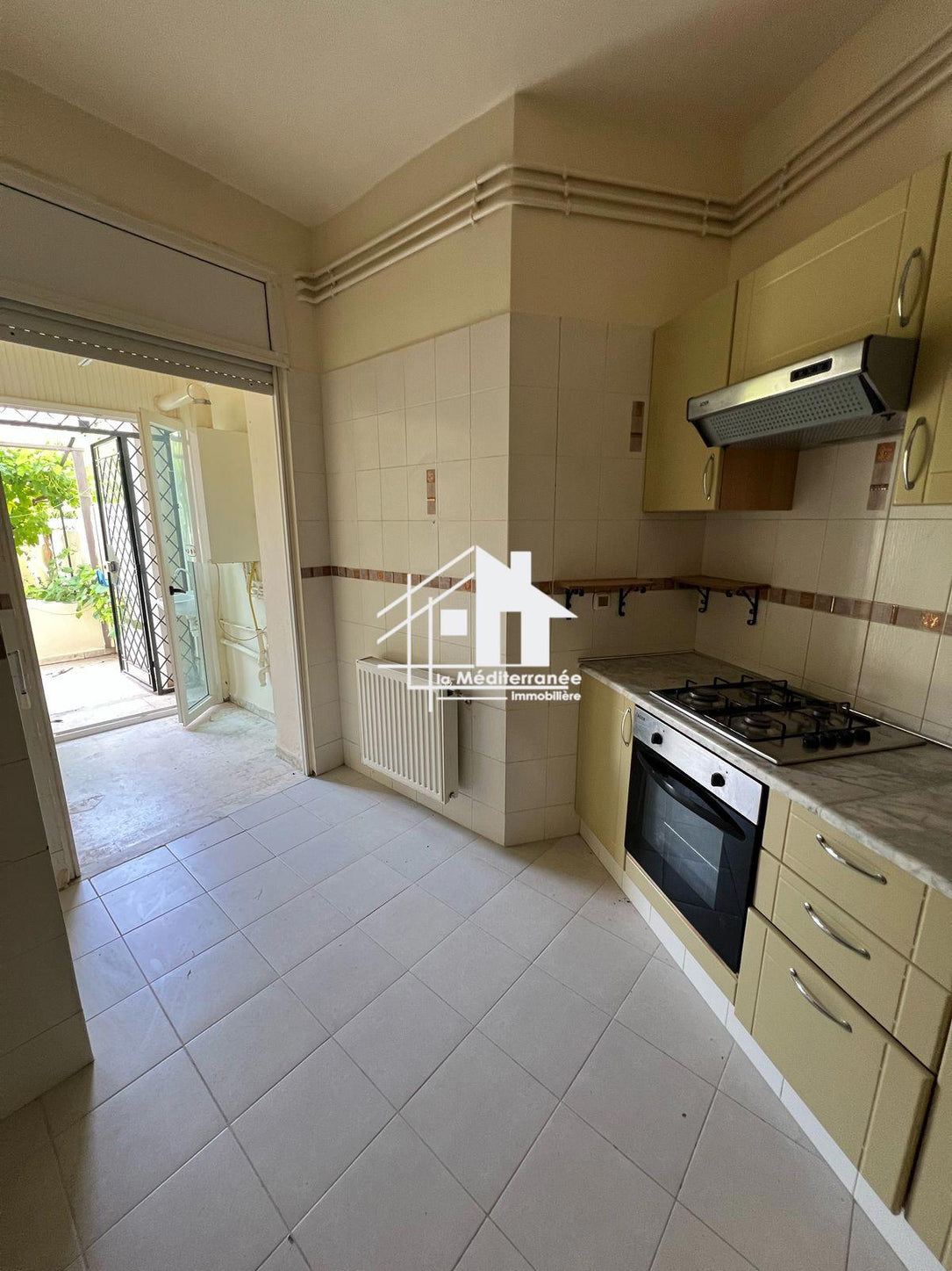 À vendre Appartement S+2 avec jardin à El Menzah 7bis