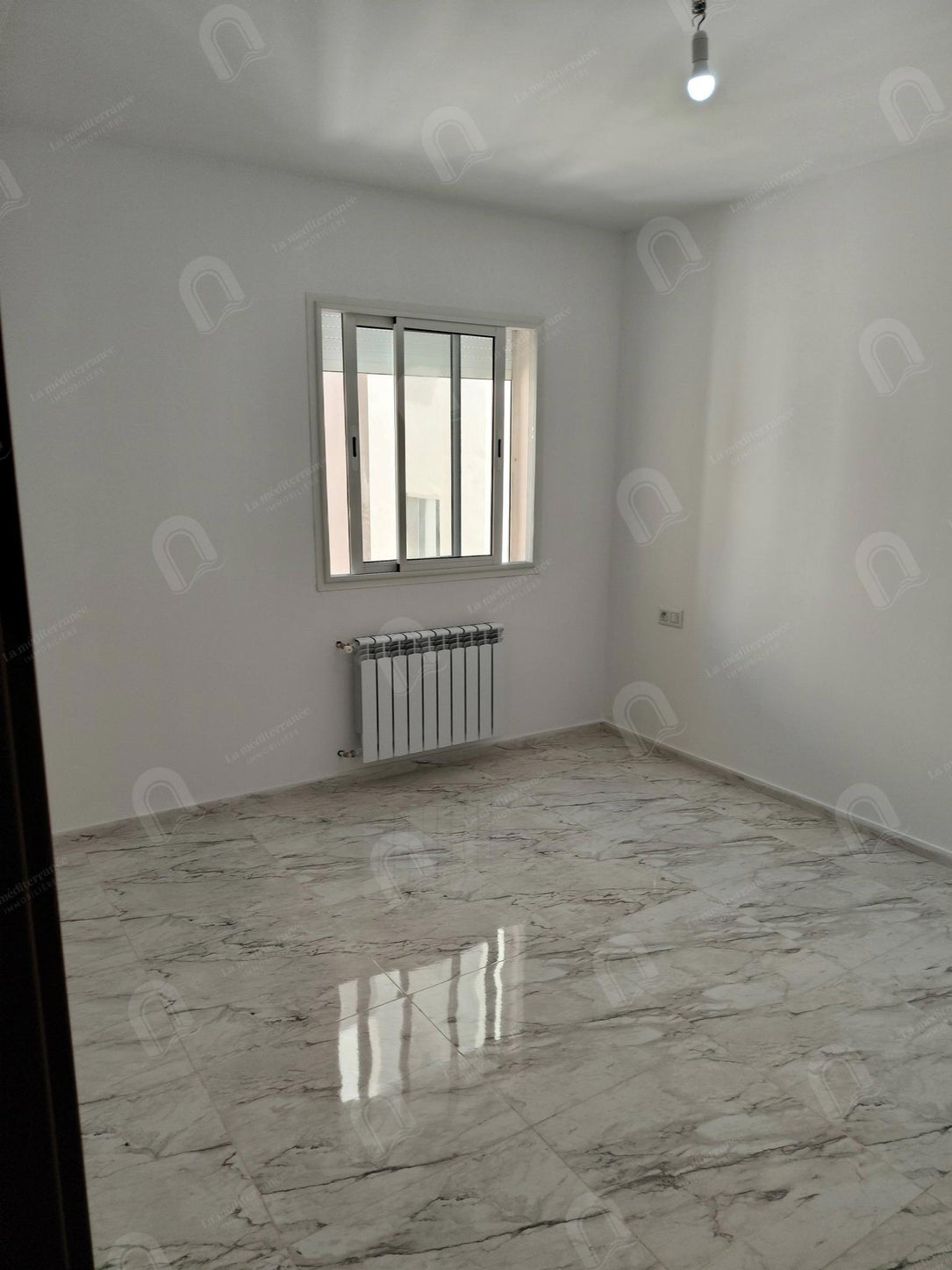 A louer appartement S+2 hst jamais habité à cité Ettahrir