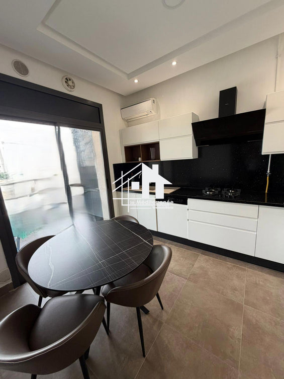 un appartement s+2 dans une résidence gardée