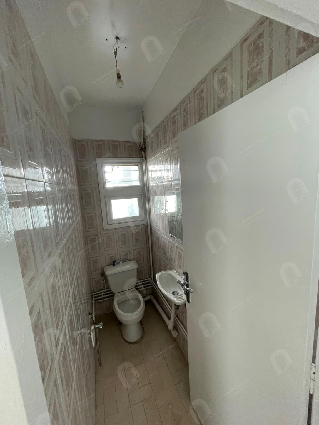 A vendre un appartement S+3 à cité ennasr