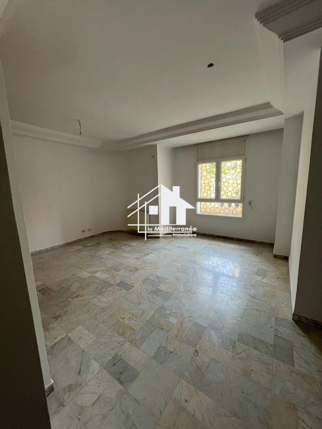 À vendre Appartement S+2 avec jardin à El Menzah 7bis