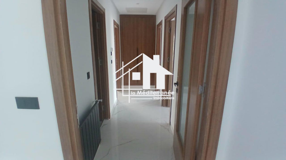 A vendre un appartement S+3 RDC a jardin de carthage