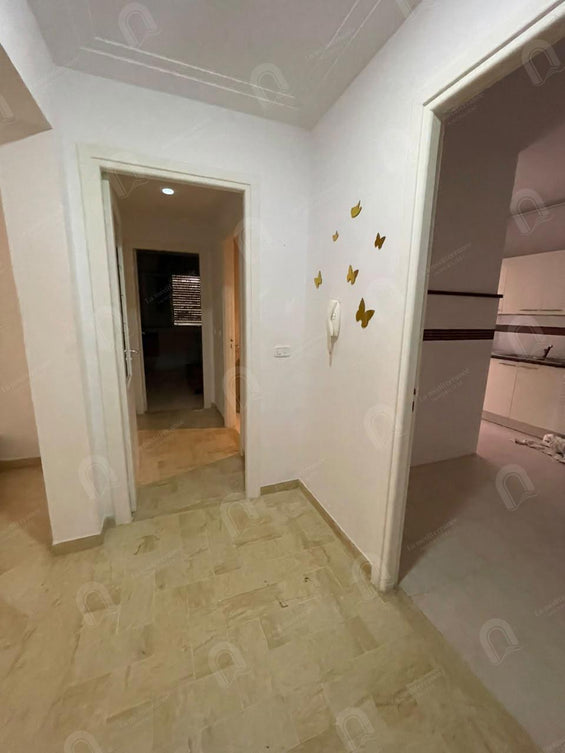 A vendre un appartement s+2 à jardin d'el menzah 22