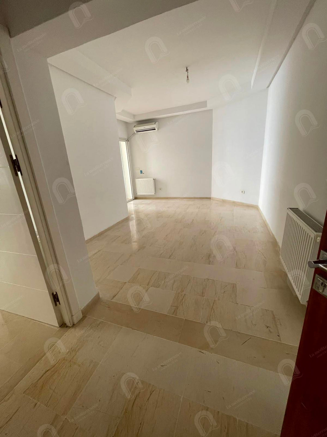 a vendre  un appartement s+2  jardin el menzeh 2