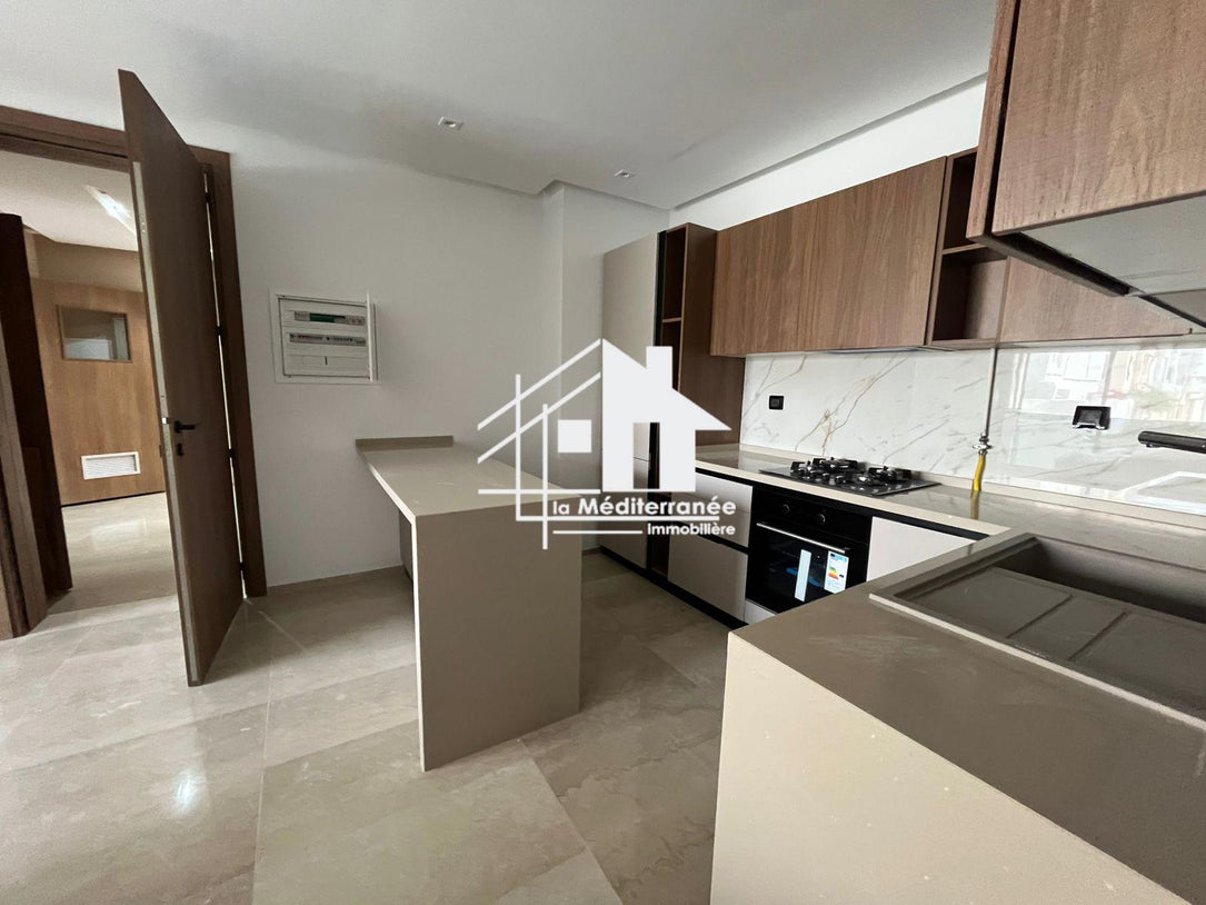 A vendre un appartement S+1 direct promoteur à Jardin de Carthage