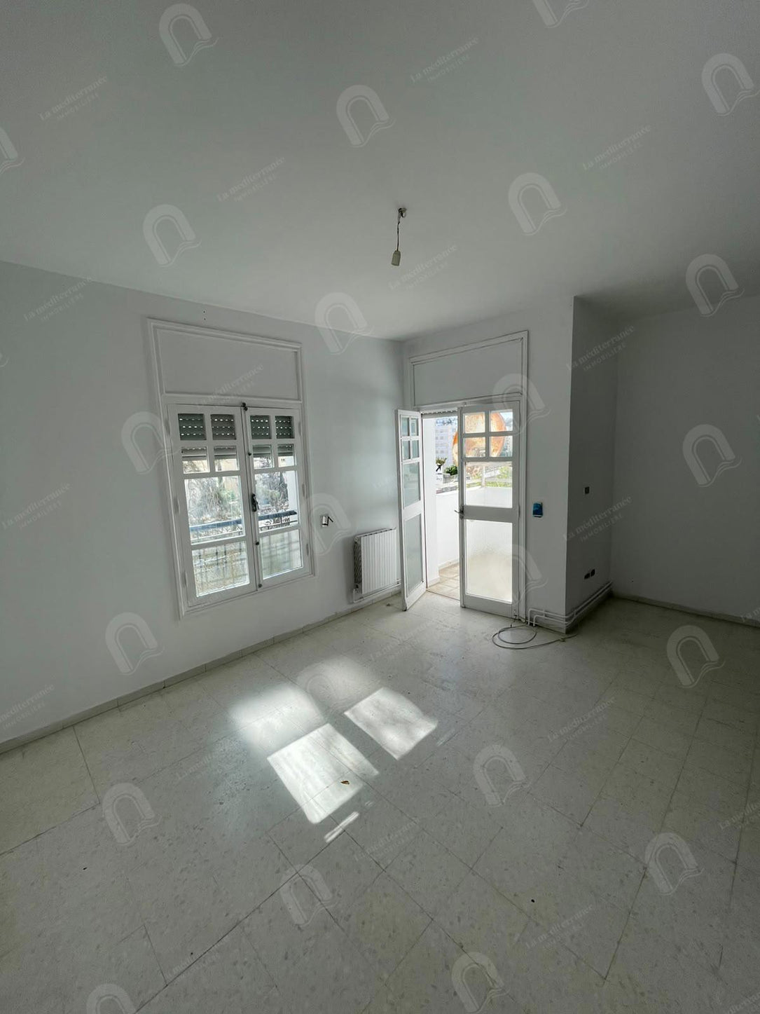 A vendre un appartement S+3 à cité ennasr