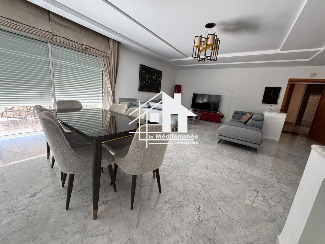 un appartement s+3 dans une résidence gardée