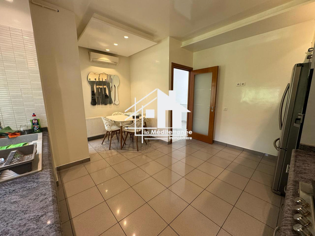 un appartement s+3 dans une résidence gardée