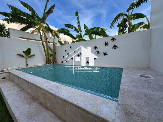 A louer un magnifique appartement en S+1meublé  ave piscine aux jardins de Carthage