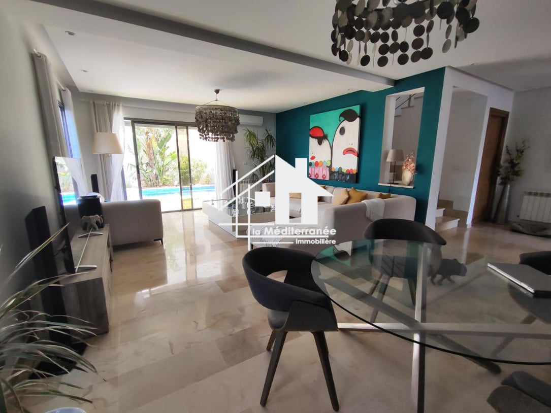 A vendre une superbe villa jumelée avec piscine et jardin