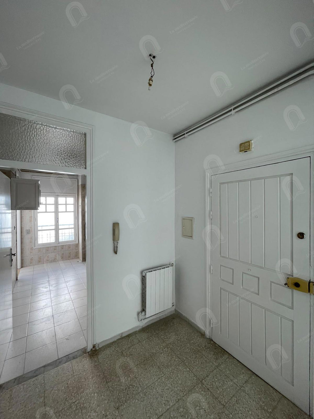 A vendre un appartement S+3 à cité ennasr