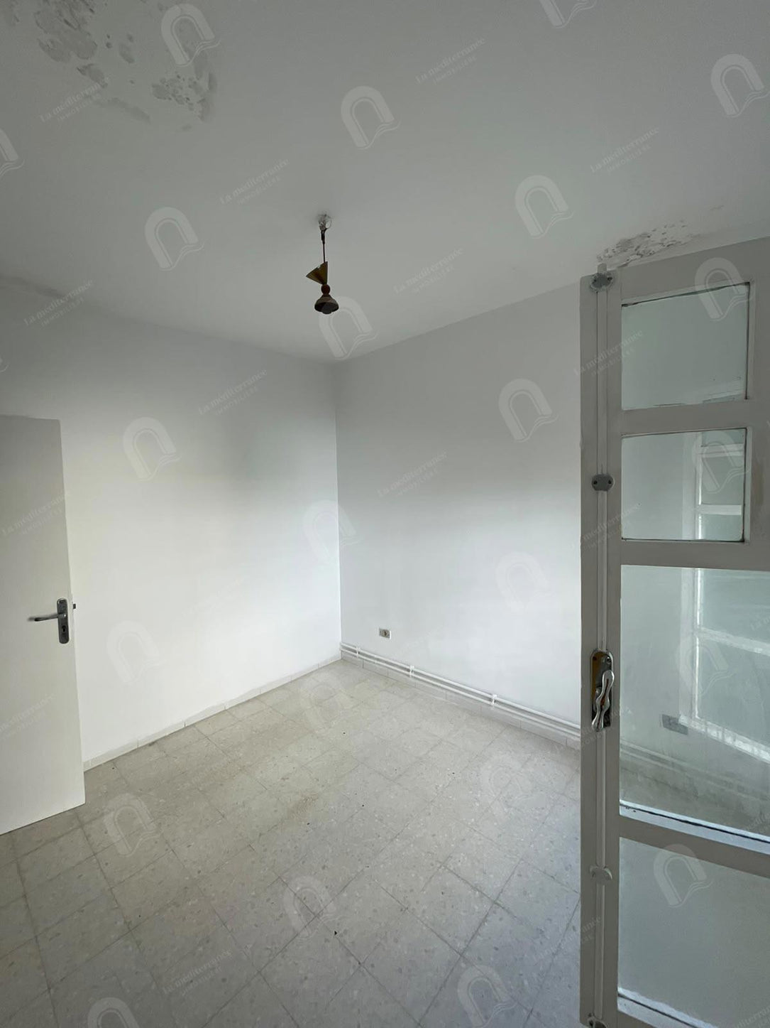 A vendre un appartement S+3 à cité ennasr