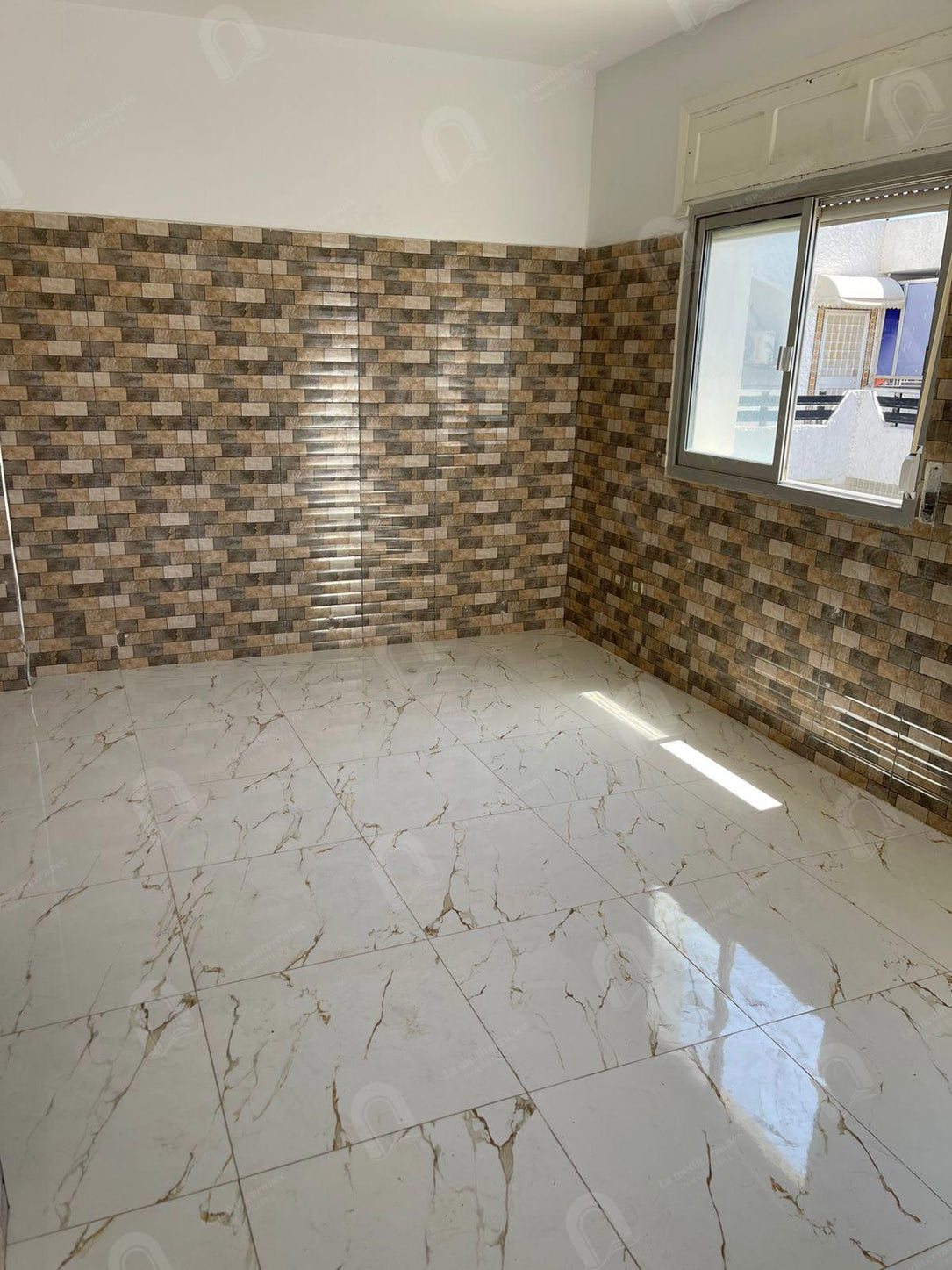 A louer un appartement s+1 à cité Ennaser