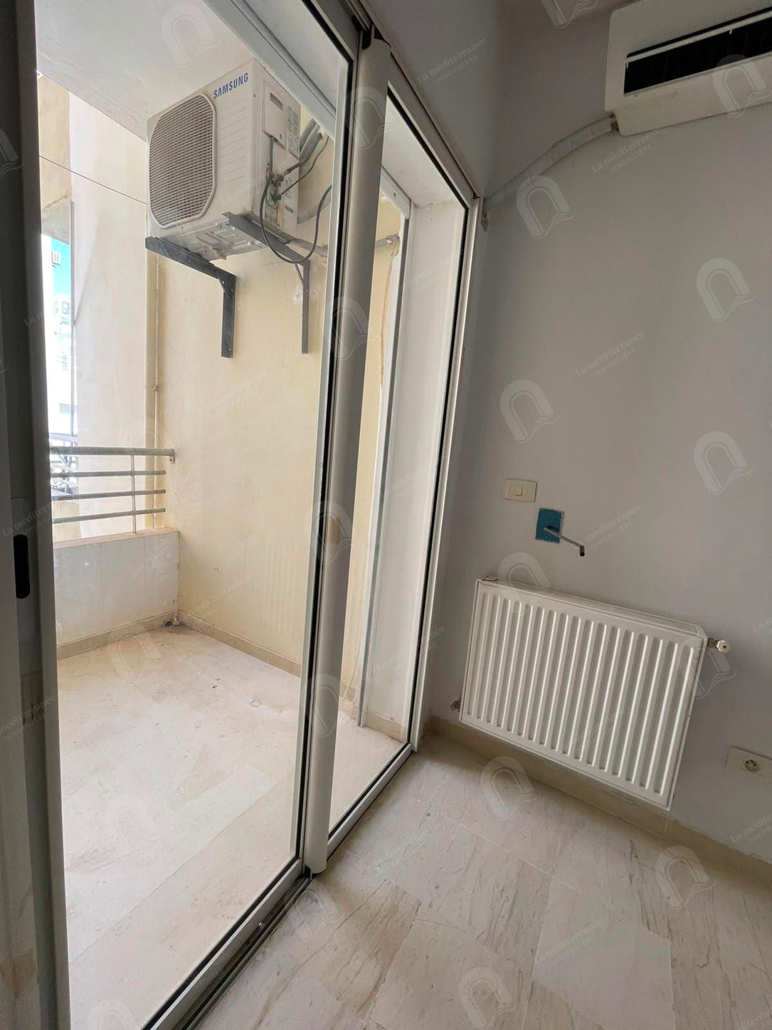 a vendre  un appartement s+2  jardin el menzeh 2