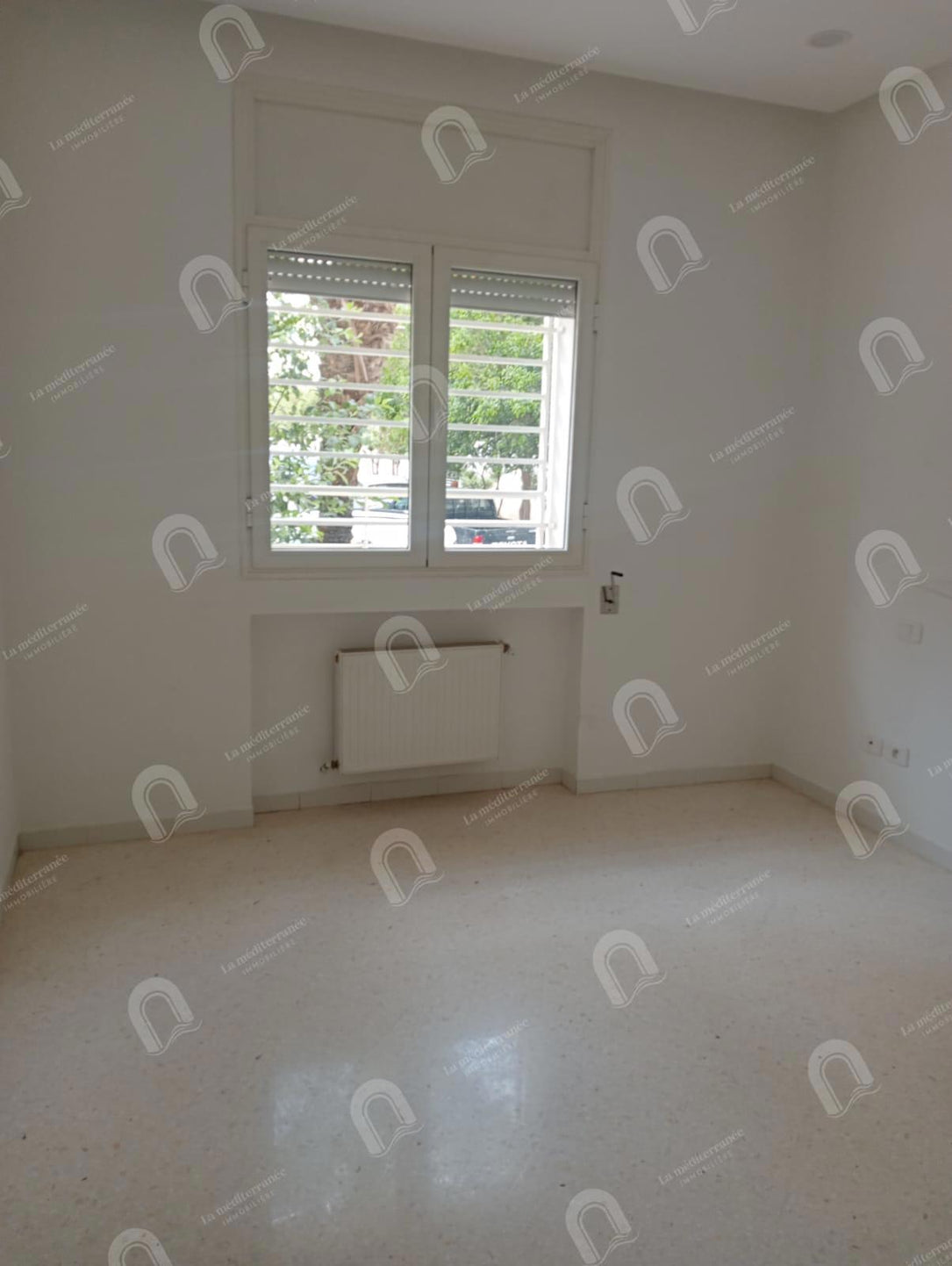 à vendre un appartement s+2 aux jardins d'el menzah 2