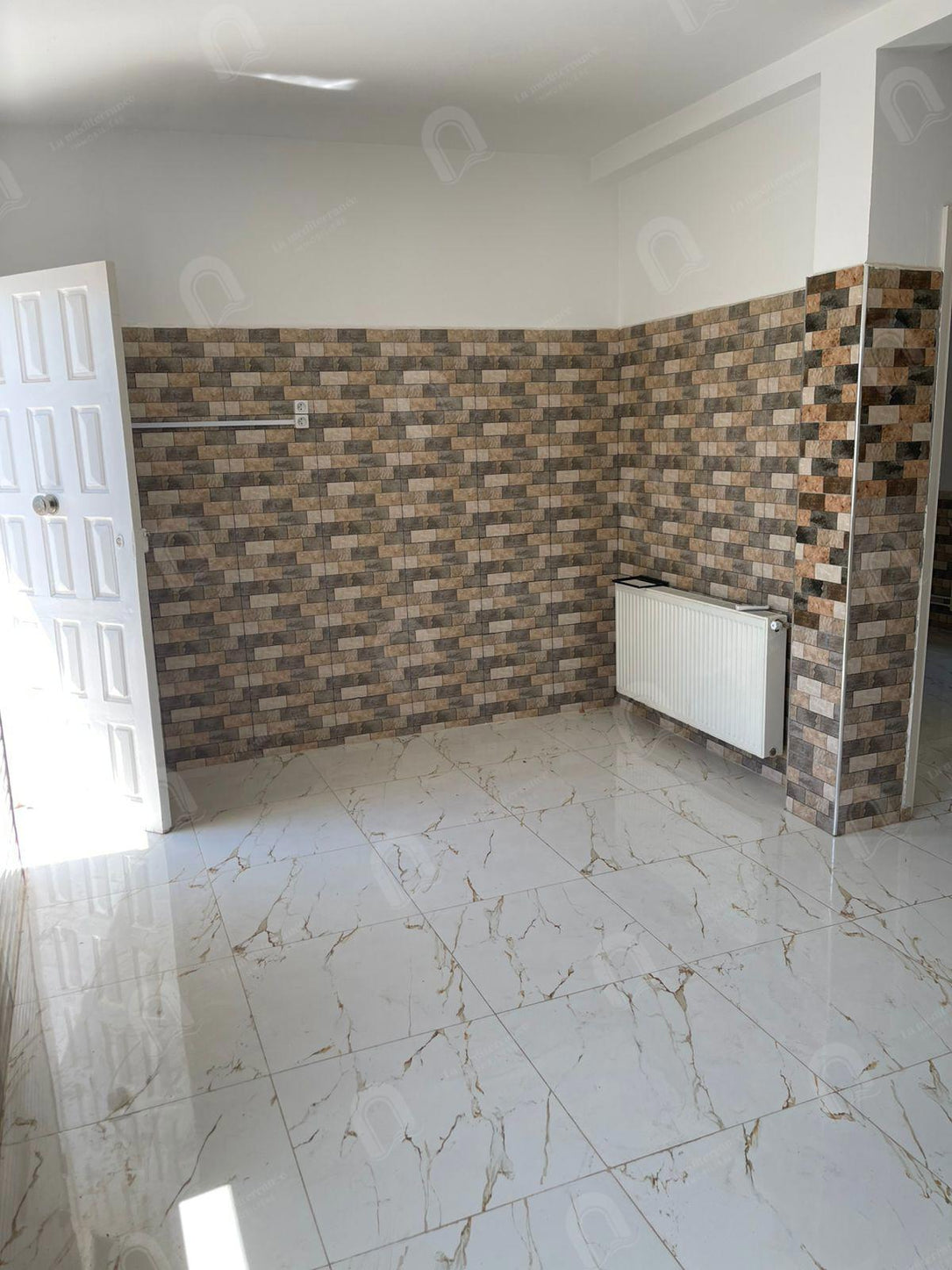 A louer un appartement s+1 à cité Ennaser