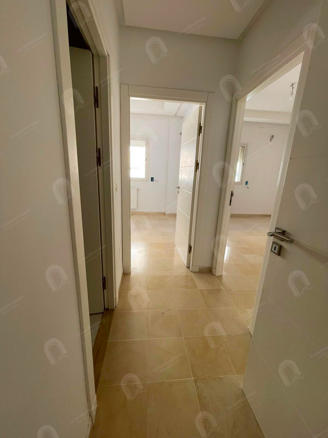 a vendre  un appartement s+2  jardin el menzeh 2